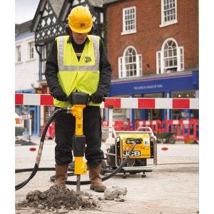 Worker using vibrating equipment during a human vibration assessment with Svantek SV 106A